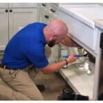 how to stop water leak from kitchen sink